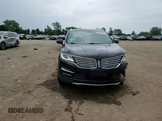 2017 Lincoln MKC Reserve z VIN 5LMTJ3DH2HUL46883, wystawiony jako Copart lot #60830925 z przebiegiem 56 077 mil mil oraz Szkoda całkowita • Salvage title. Historia ofert i sprzedaży dostępna na DreamBid. Obrazek 13.