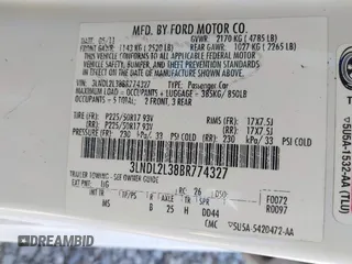 2011 Lincoln MKZ Hybrid with VIN 3LNDL2L38BR774327, listed as a IAAI auction lot 41820314 with 212,355 mi miles. Bid and sale history available at carsss.com. Image 9.