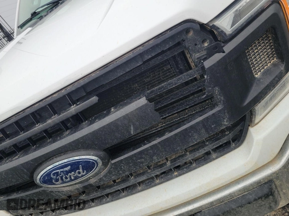 2019 Ford F-150 XL with VIN 1FTEX1E55KKC02870, listed as a IAAI auction lot 42631387 with 206,967 mi miles and . Bid and sale history available at DreamBid. Image 14.