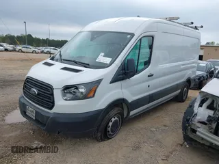 2019 Ford Transit z VIN 1FTYR2CM8KKA13993, wystawiony jako IAAI lot #41955116 z przebiegiem 91 395 mil mil oraz . Historia ofert i sprzedaży dostępna na DreamBid. Obrazek 17.