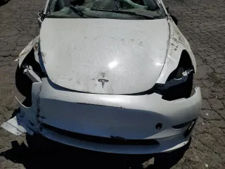 2023 Tesla Model 3 with VIN 5YJ3E1EA0PF491347, listed as a Copart auction lot 64136235 with Not provided miles and Clean title. Bid and sale history available at DreamBid. Image 12.