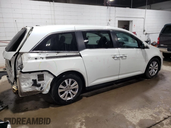 2015 Honda Odyssey EX-L with VIN 5FNRL5H68FB042107, listed as a Copart auction lot 51000525 with 140,793 mi miles and Salvage Title. Bid and sale history available at DreamBid. Image 3.