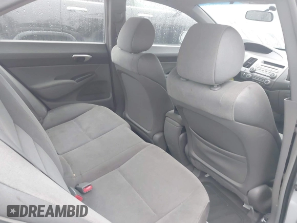 2006 Honda Civic LX with VIN 2HGFA16556H520894, listed as a IAAI auction lot 41963736 with 166,682 mi miles and . Bid and sale history available at DreamBid. Image 8.