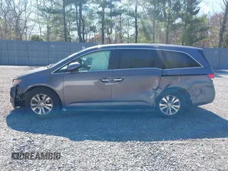 2016 Honda Odyssey SE with VIN 5FNRL5H39GB048487, listed as a IAAI auction lot 42059132 with 140,411 mi miles and . Bid and sale history available at DreamBid. Image 14.