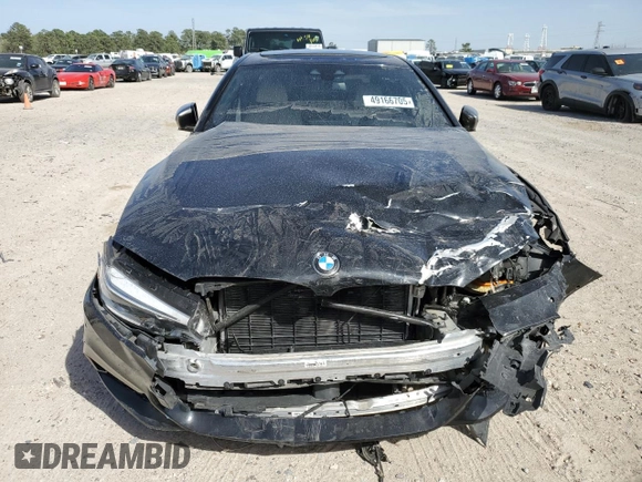2020 BMW 5 Series M550i xDrive z VIN WBAJS7C01LCD23365, wystawiony jako Copart lot #49166705 z przebiegiem 42 293 mil mil oraz Szkoda całkowita • Salvage title. Historia ofert i sprzedaży dostępna na DreamBid. Obrazek 5.