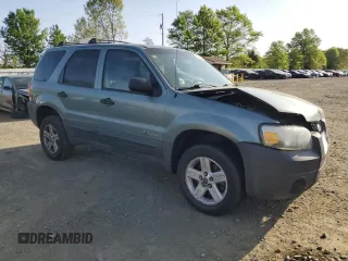 2005 Ford Escape Hybrid with VIN 1FMCU96HX5KC45835, listed as a Copart auction lot 55238065 with 223,769 mi miles and Salvage title. Bid and sale history available at DreamBid. Image 4.