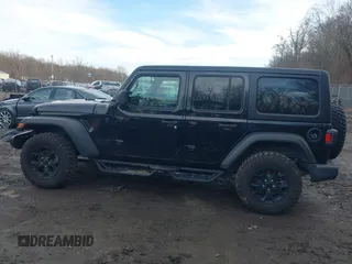 2022 Jeep Wrangler Unlimited Sport S with VIN 1C4HJXDG1NW141244, listed as a IAAI auction lot 41532388 with 27,829 mi miles. Bid and sale history available at carsss.com. Image 14.