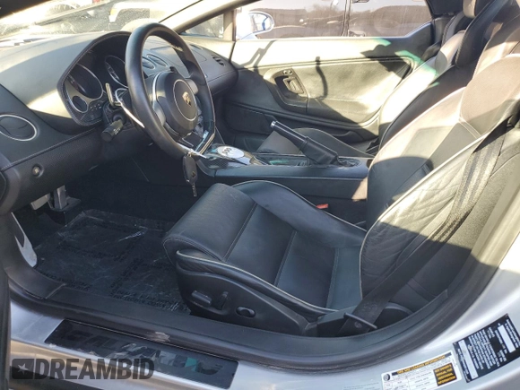 2007 Lamborghini Gallardo z VIN ZHWGU22T57LA05137, wystawiony jako Copart lot #78841294 z przebiegiem 5504 mil mil oraz Szkody całkowita. Historia ofert i sprzedaży dostępna na DreamBid. Obrazek 7.