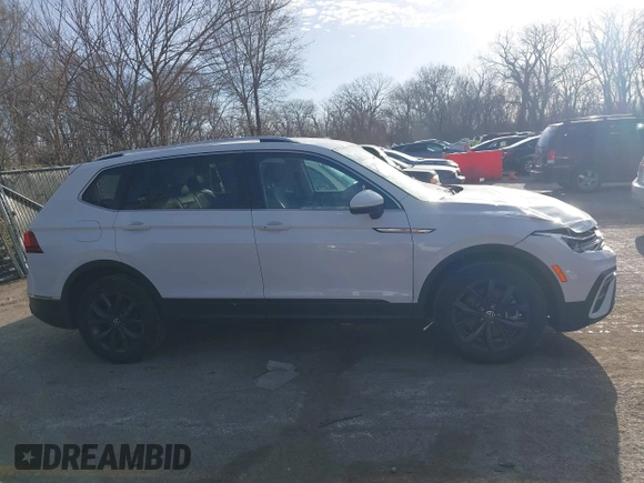 2022 Volkswagen Tiguan SE with VIN 3VV3B7AX9NM076592, listed as a IAAI auction lot 41816250 with 52,688 mi miles and . Bid and sale history available at DreamBid. Image 14.