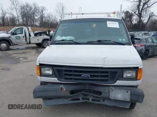 2004 Ford Econoline Cargo z VIN 1FTNE24L04HB05474, wystawiony jako IAAI lot #41320247 z przebiegiem 153 216 mil mil oraz . Historia ofert i sprzedaży dostępna na DreamBid. Obrazek 12.