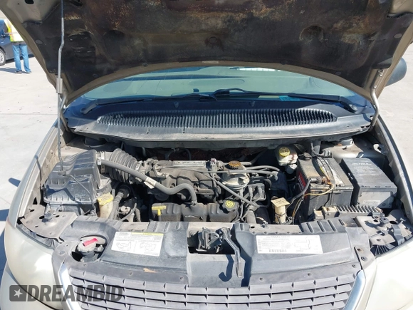 2003 Chrysler Town & Country LX with VIN 2C4GP44L73R103612, listed as a IAAI auction lot 41680848 with 211,360 mi miles and . Bid and sale history available at DreamBid. Image 10.