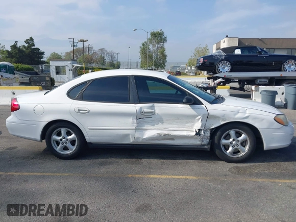 2003 Ford Taurus SES Standard with VIN 1FAFP55293G176494, listed as a IAAI auction lot 42040985 with 95,550 mi miles. Bid and sale history available at carsss.com. Image 13.