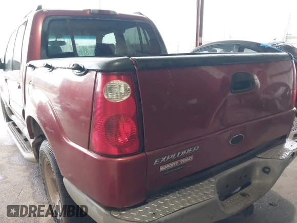 2002 Ford Explorer Sport Trac Value z VIN 1FMZU67E42UC82277, wystawiony jako IAAI lot #41903475 z przebiegiem 187 087 mil mil oraz . Historia ofert i sprzedaży dostępna na DreamBid. Obrazek 3.
