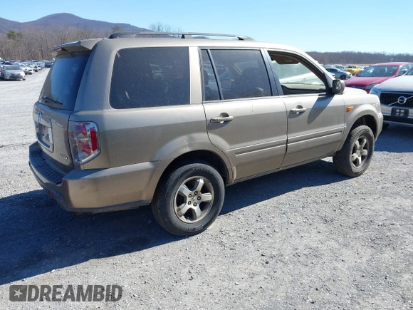 2008 Honda Pilot EX-L with VIN 5FNYF18778B052859, listed as a IAAI auction lot 41695095 with 249,207 mi miles and . Bid and sale history available at DreamBid. Image 4.