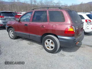 2003 Hyundai Santa Fe GLS with VIN KM8SC13E43U526945, listed as a IAAI auction lot 41847683 with 180,986 mi miles. Bid and sale history available at carsss.com. Image 3.