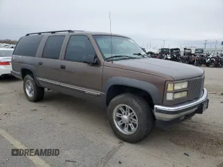1997 GMC Suburban with VIN 3GKGK26J0VG513194, listed as a Copart auction lot 45054235 with 228,363 mi miles and Salvage Title. Bid and sale history available at carsss.com. Image 4.