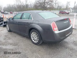 2014 Chrysler 300 with VIN 2C3CCAAG7EH377454, listed as a IAAI auction lot 41964310 with 277,209 mi miles. Bid and sale history available at carsss.com. Image 3.