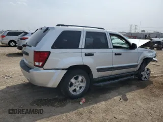 2005 Jeep Grand Cherokee Laredo z VIN 1J4GR48KX5C581833, wystawiony jako Copart lot #60975355 z przebiegiem 149 993 mil mil oraz Szkoda całkowita • Salvage title. Historia ofert i sprzedaży dostępna na DreamBid. Obrazek 3.