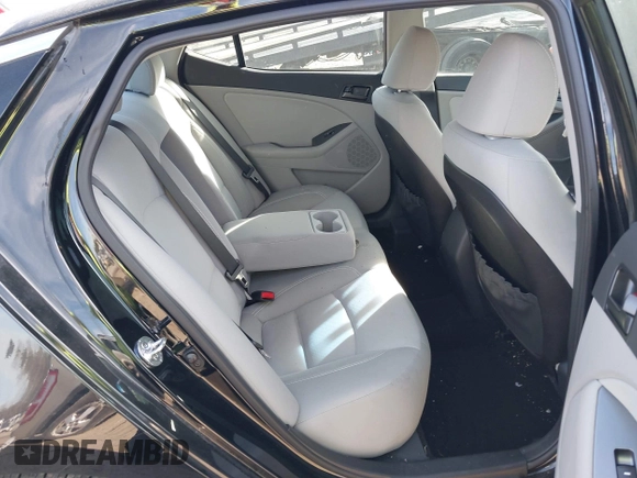 2013 Kia Optima LX with VIN 5XXGM4A74DG101584, listed as a IAAI auction lot 41835179 with 123,689 mi miles. Bid and sale history available at carsss.com. Image 8.