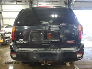2004 GMC Envoy SLT with VIN 1GKDT13S642191868, listed as a Copart auction lot 82334304 with 150,810 mi miles and Salvage Title. Bid and sale history available at carsss.com. Image 6.