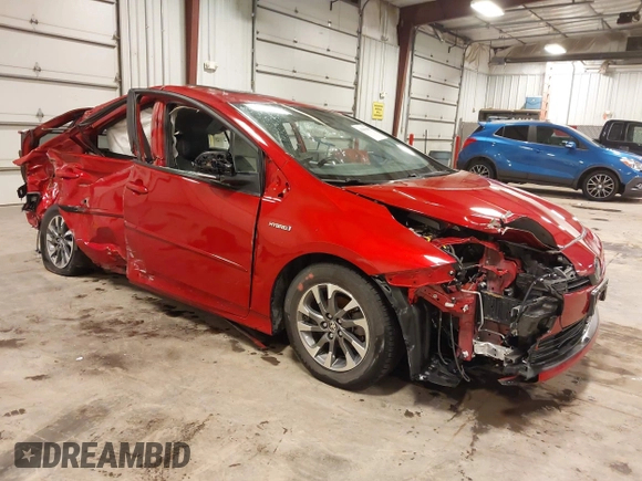 2021 Toyota Prius L Eco z VIN JTDKAMFU1M3143311, wystawiony jako IAAI lot #41961005 z przebiegiem 42 275 mil mil oraz . Historia ofert i sprzedaży dostępna na DreamBid. Obrazek 1.