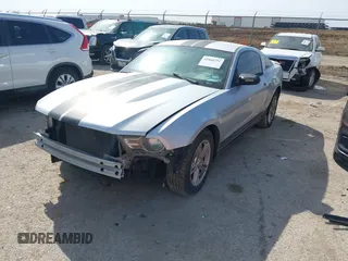 2012 Ford Mustang Premium with VIN 1ZVBP8AM5C5234532, listed as a IAAI auction lot 41860791 with 106,929 mi miles and . Bid and sale history available at DreamBid. Image 17.
