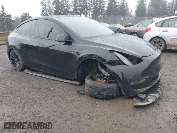 2021 Tesla Model Y Performance z VIN 5YJYGDEF2MF215938, wystawiony jako IAAI lot #41338287 z przebiegiem 63 925 mil mil oraz . Historia ofert i sprzedaży dostępna na DreamBid. Obrazek 1.