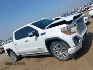 2021 GMC Sierra 1500 Denali z VIN 3GTU9FEL1MG349215, wystawiony jako IAAI lot #42585810 z przebiegiem 97 465 mil mil oraz . Historia ofert i sprzedaży dostępna na DreamBid. Obrazek 13.