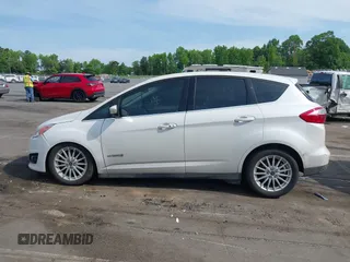 2015 Ford C-Max SEL z VIN 1FADP5BU1FL111048, wystawiony jako IAAI lot #42171942 z przebiegiem 132 637 mil mil oraz . Historia ofert i sprzedaży dostępna na DreamBid. Obrazek 14.