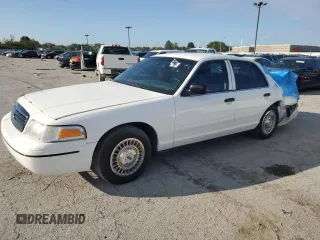 1999 Ford Crown Victoria Police with VIN 2FAFP71W7XX156457, listed as a Copart auction lot 71623954 with 123,313 mi miles and Salvage Title. Bid and sale history available at carsss.com. Image 1.