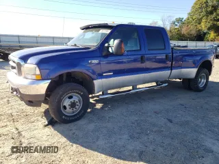 2003 Ford F-350 XL with VIN 1FTWW33P43EB78603, listed as a Copart auction lot 76317284 with 228,798 mi miles and Salvage Title. Bid and sale history available at DreamBid. Image 1.
