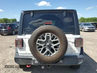2018 Jeep Wrangler Unlimited Rubicon z VIN 1C4HJXFN3JW176213, wystawiony jako Copart lot #53963755 z przebiegiem 53 094 mil mil oraz Szkoda całkowita • Salvage title. Historia ofert i sprzedaży dostępna na DreamBid. Obrazek 6.