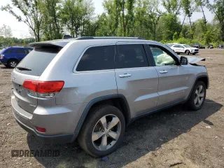 2014 Jeep Grand Cherokee Limited with VIN 1C4RJFBG9EC501136, listed as a Copart auction lot 59873595 with 203,819 mi miles and Salvage title. Bid and sale history available at DreamBid. Image 3.