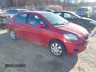 2010 Toyota Yaris with VIN JTDBT4K39A4070153, listed as a IAAI auction lot 41519671 with 169,090 mi miles. Bid and sale history available at carsss.com. Image 1.