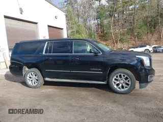 2015 GMC Yukon XL SLT with VIN 1GKS2HKC9FR159164, listed as a IAAI auction lot 41235420 with 136,730 mi miles. Bid and sale history available at carsss.com. Image 13.