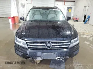 2021 Volkswagen Tiguan S z VIN 3VV0B7AX4MM015717, wystawiony jako Copart lot #55896295 z przebiegiem 78 821 mil mil oraz Szkoda całkowita • Salvage title. Historia ofert i sprzedaży dostępna na DreamBid. Obrazek 5.