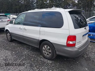 2005 Kia Sedona LX with VIN KNDUP132X56742698, listed as a IAAI auction lot 41637967 with 118,346 mi miles. Bid and sale history available at carsss.com. Image 3.