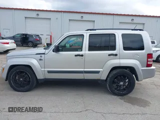 2009 Jeep Liberty Sport with VIN 1J8GN28K39W520228, listed as a IAAI auction lot 41961381 with 196,187 mi miles. Bid and sale history available at carsss.com. Image 15.