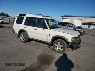 2000 Land Rover Discovery Cloth with VIN SALTY1241YA250907, listed as a Copart auction lot 81405614 with 95,310 mi miles and Salvage Title. Bid and sale history available at DreamBid. Image 4.