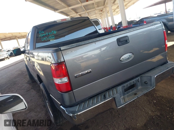 2004 Ford F-150 XLT with VIN 1FTRW12W14KD43052, listed as a IAAI auction lot 41439615 with 241,554 mi miles. Bid and sale history available at carsss.com. Image 3.