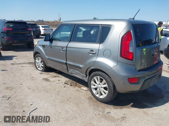 2012 Kia Soul + with VIN KNDJT2A69C7386679, listed as a IAAI auction lot 41969598 with 319,595 mi miles. Bid and sale history available at carsss.com. Image 3.