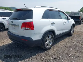 2013 Kia Sorento EX with VIN 5XYKUDA61DG384037, listed as a IAAI auction lot 42449718 with 173,688 mi miles and . Bid and sale history available at DreamBid. Image 4.