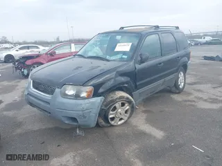 2004 Ford Escape XLT with VIN 1FMCU03114KB25567, listed as a IAAI auction lot 41559575 with 238,685 mi miles. Bid and sale history available at carsss.com. Image 2.