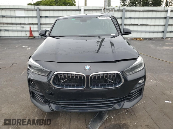 2018 BMW X2 sDrive28i with VIN WBXYJ3C34JEJ91176, listed as a Copart auction lot 63418365 with 62,586 mi miles and Salvage title. Bid and sale history available at DreamBid. Image 5.