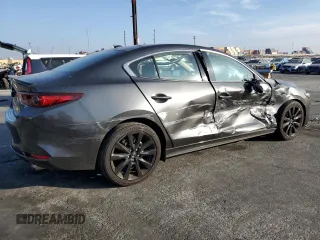 2023 Mazda 3 Premium Plus with VIN 3MZBPBEY2PM377464, listed as a Copart auction lot 83273744 with 6,299 mi miles and Salvage Title. Bid and sale history available at DreamBid. Image 2.