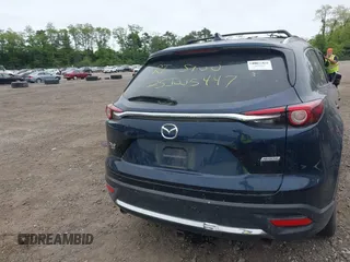 2018 Mazda CX-9 Grand Touring with VIN JM3TCBDY8J0209737, listed as a IAAI auction lot 42374826 with Not provided miles and . Bid and sale history available at DreamBid. Image 15.