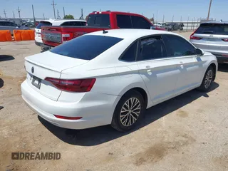 2021 Volkswagen Jetta S z VIN 3VWC57BU8MM035618, wystawiony jako IAAI lot #41998464 z przebiegiem 56 099 mil mil oraz . Historia ofert i sprzedaży dostępna na DreamBid. Obrazek 4.