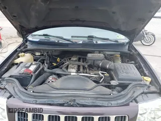 2004 Jeep Grand Cherokee Laredo z VIN 1J4GW48S94C209326, wystawiony jako IAAI lot #42309565 z przebiegiem 159 429 mil mil oraz . Historia ofert i sprzedaży dostępna na DreamBid. Obrazek 10.