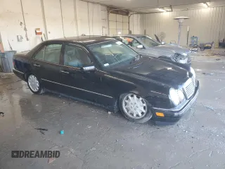 1998 Mercedes-Benz E-Class with VIN WDBJF65F2WA518941, listed as a Copart auction lot 42422425 with 153,131 mi miles and Salvage Title. Bid and sale history available at carsss.com. Image 4.