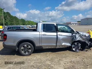 2020 Honda Ridgeline RTL with VIN 5FPYK3F5XLB025857, listed as a IAAI auction lot 42307343 with 97,262 mi miles and . Bid and sale history available at DreamBid. Image 13.
